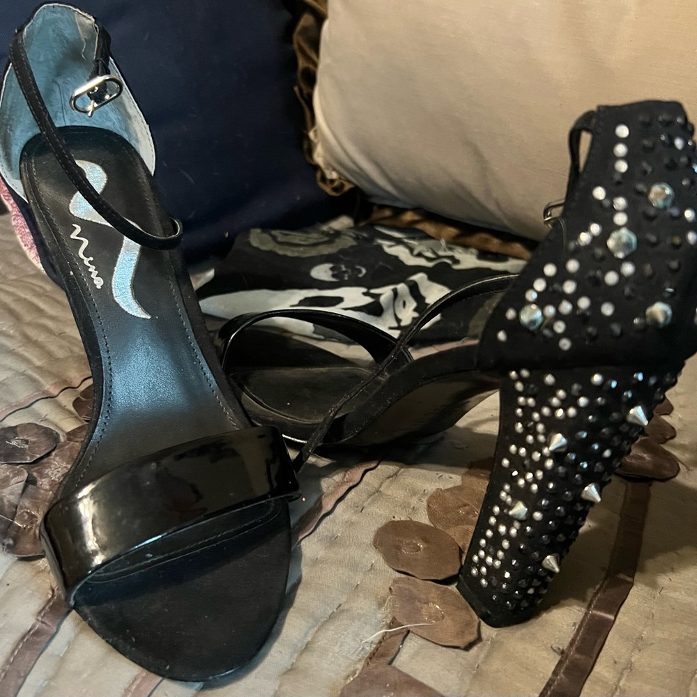 Size 8 black open toes heels with jewels and spikes on heels.